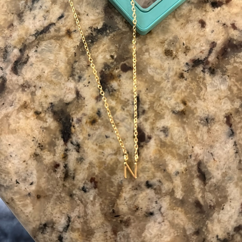 Gold “N” necklace